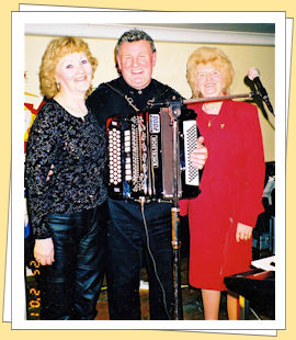 johnny barrett with two marys on  stage in tipparary